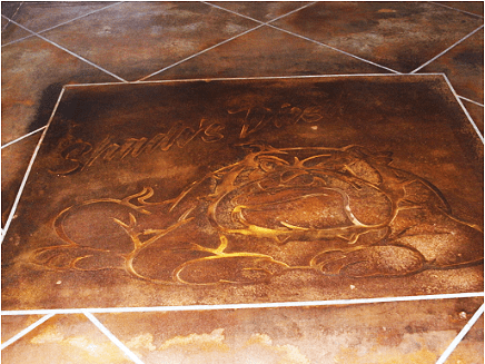 Logo On Concrete Floor Made with Coffee Brown Acid Stain, Diluted with Water. Sealed with Satin Finish Sealer.